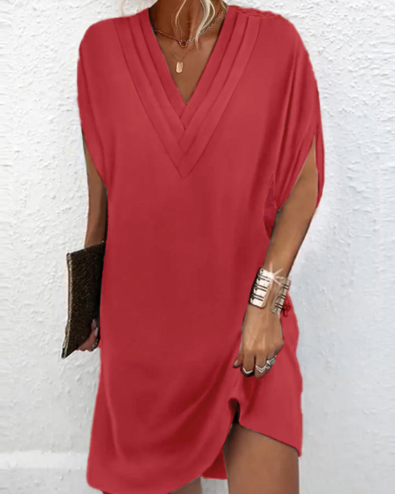 Stylish solid color dress with trendy slit sleeves