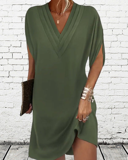 Stylish solid color dress with trendy slit sleeves