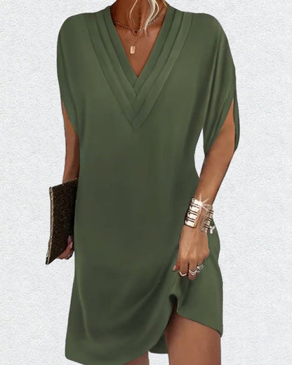 Stylish solid color dress with trendy slit sleeves
