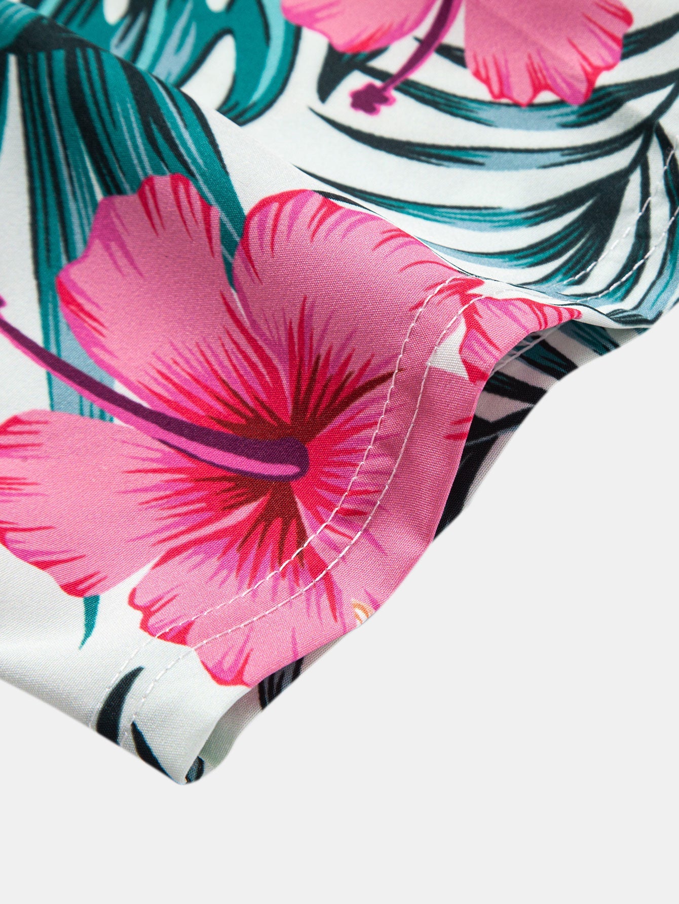 Button-up shirt with tropical flower print & swim trunks with zippered pocket