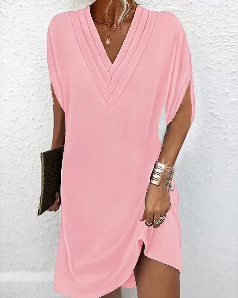 Stylish solid color dress with trendy slit sleeves